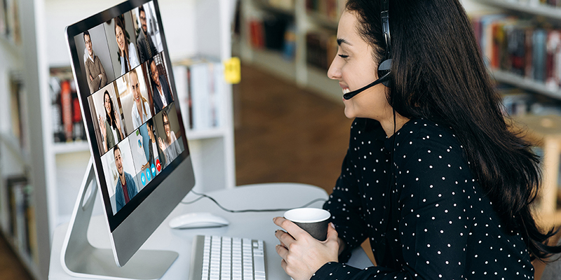 author participating in guideline committee call on computer